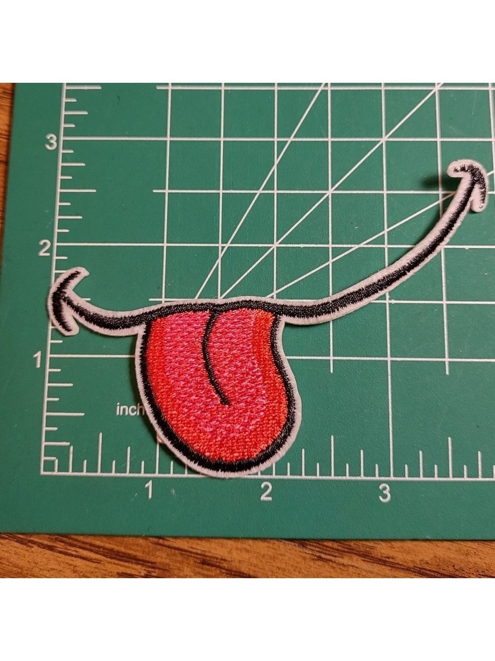 2/$10 Red Tongue Embroidered Patch